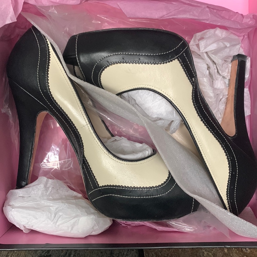 Worn maybe 3 times. Steven black and cream platform open toe shoes, size  7